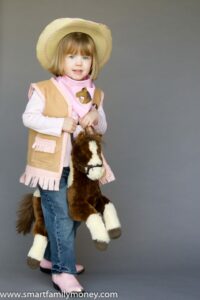 My adorable cowgirl with her homemade vest. 