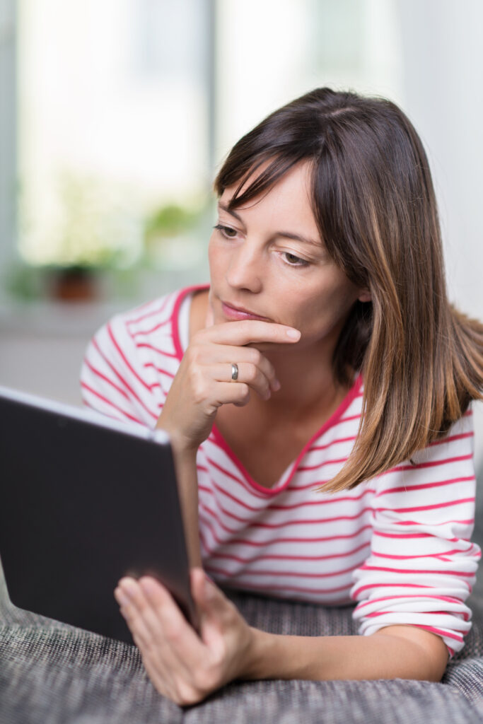 Woman looking at tablet