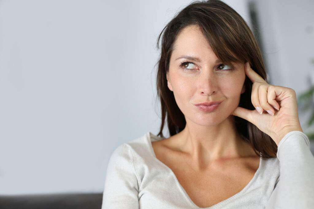 Woman with thoughtful look