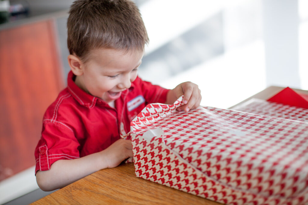 3 year old boy with a gift