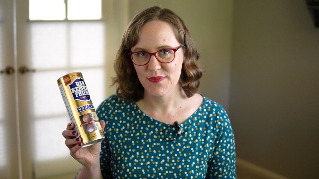 Woman holding Bar Keepers Friend