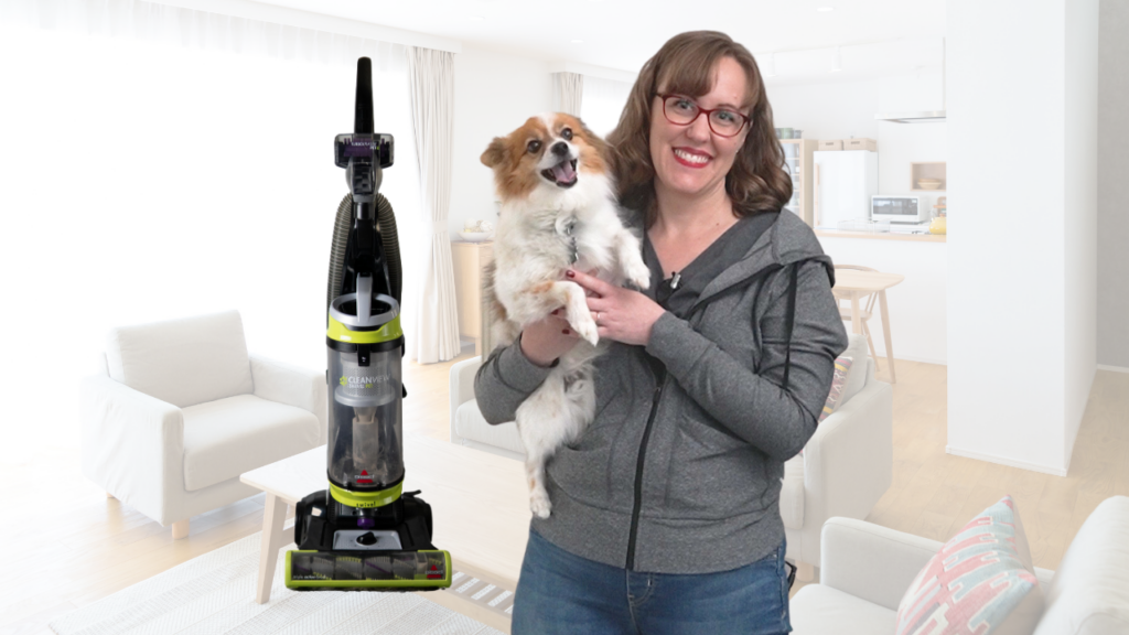 Woman with dog and vacuum
